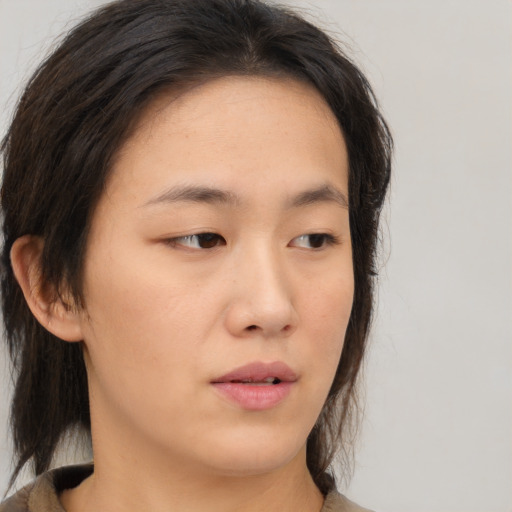 Neutral asian young-adult female with medium  brown hair and brown eyes
