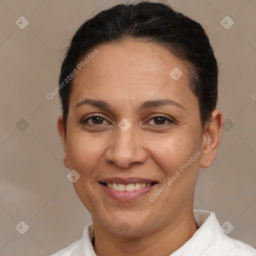 Joyful white adult female with short  brown hair and brown eyes