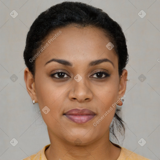 Joyful black young-adult female with short  brown hair and brown eyes