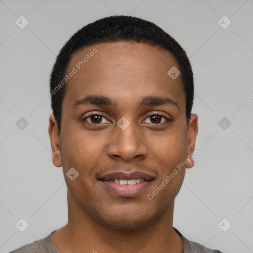 Joyful black young-adult male with short  black hair and brown eyes