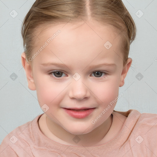 Joyful white child female with short  brown hair and brown eyes