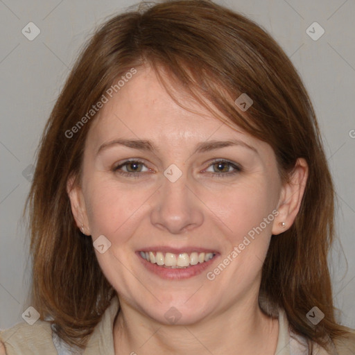 Joyful white adult female with medium  brown hair and grey eyes