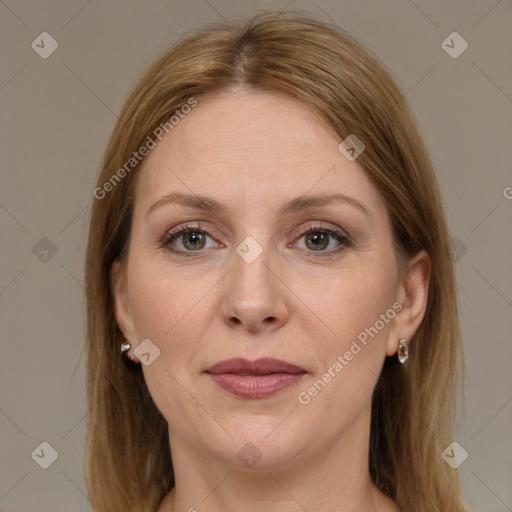 Joyful white adult female with medium  brown hair and grey eyes