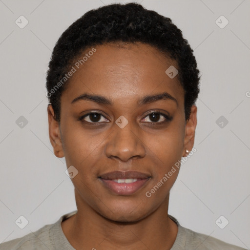 Joyful black young-adult female with short  black hair and brown eyes