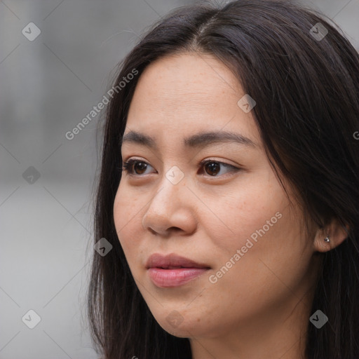 Neutral white young-adult female with long  brown hair and brown eyes