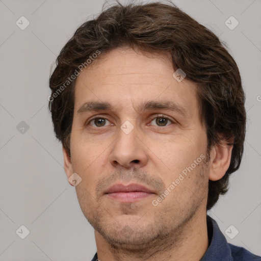 Neutral white adult male with short  brown hair and brown eyes