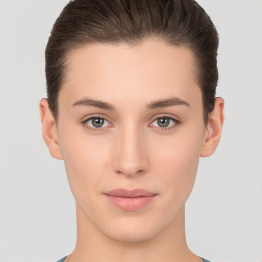 Neutral white young-adult female with short  brown hair and brown eyes