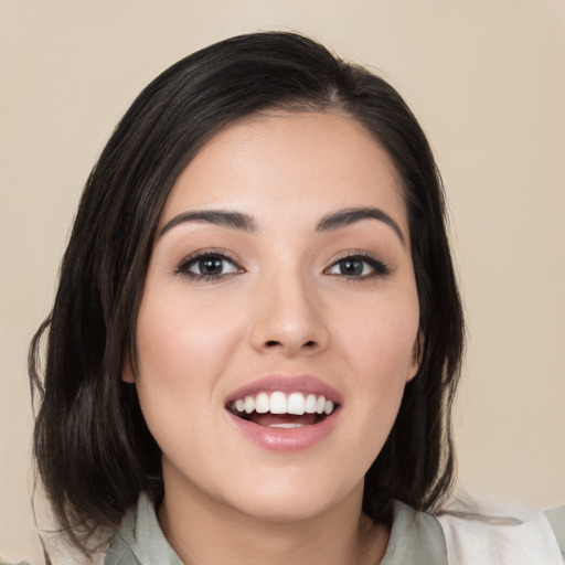 Joyful white young-adult female with medium  black hair and brown eyes