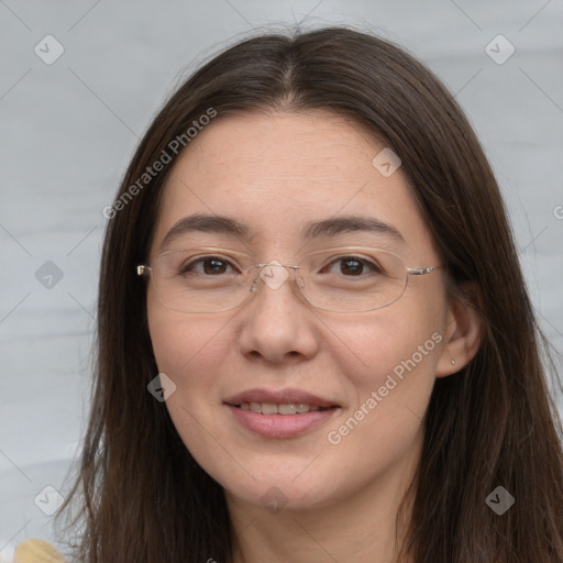 Joyful white adult female with long  brown hair and brown eyes