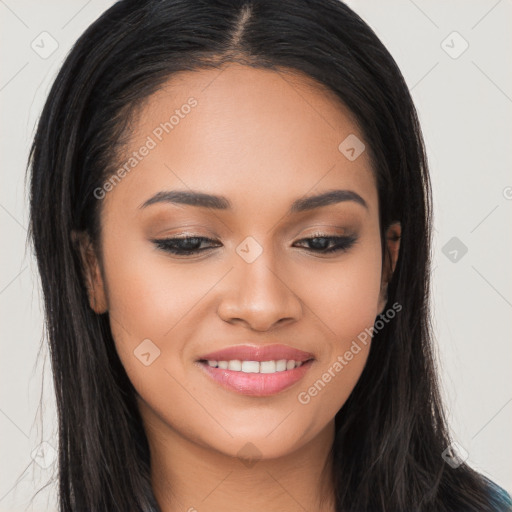 Joyful latino young-adult female with long  black hair and brown eyes