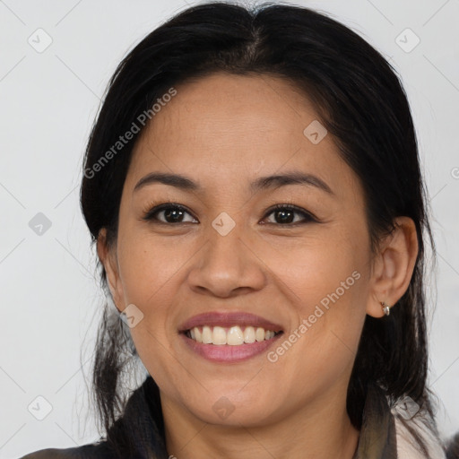 Joyful asian young-adult female with medium  brown hair and brown eyes