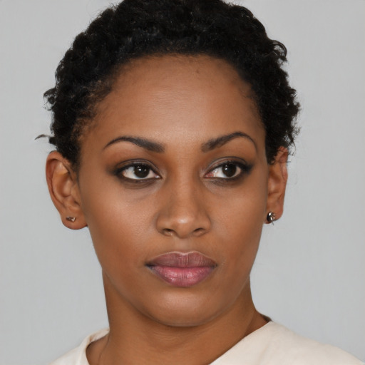Neutral black young-adult female with short  brown hair and brown eyes