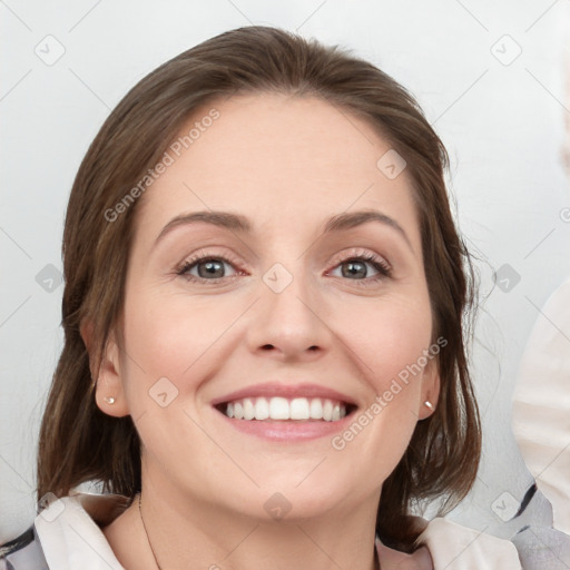 Joyful white young-adult female with medium  brown hair and blue eyes