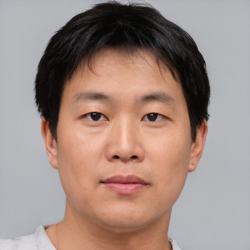 Neutral asian young-adult male with short  black hair and brown eyes