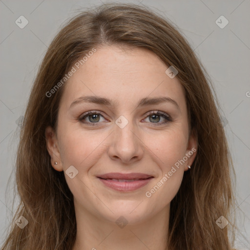 Joyful white young-adult female with long  brown hair and grey eyes