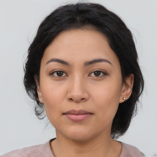 Neutral asian young-adult female with medium  black hair and brown eyes