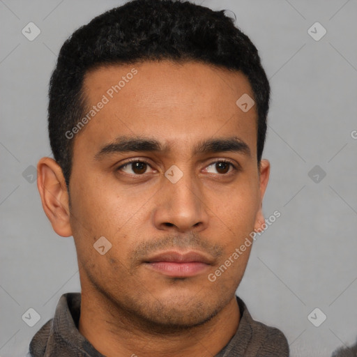 Neutral latino young-adult male with short  black hair and brown eyes