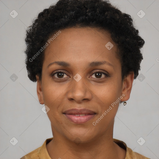 Joyful black young-adult female with short  black hair and brown eyes