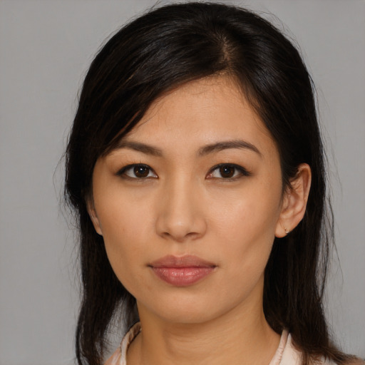 Neutral asian young-adult female with medium  black hair and brown eyes