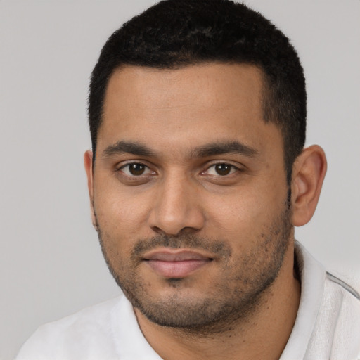 Neutral black young-adult male with short  black hair and brown eyes