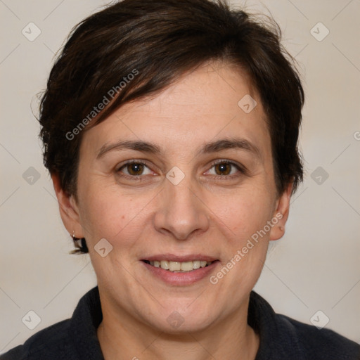 Joyful white adult female with short  brown hair and brown eyes