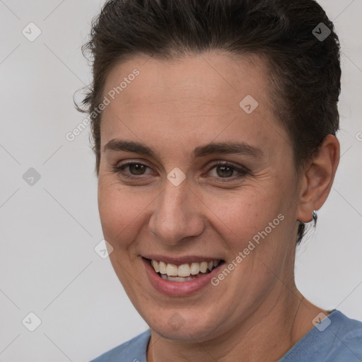 Joyful white young-adult female with short  brown hair and brown eyes