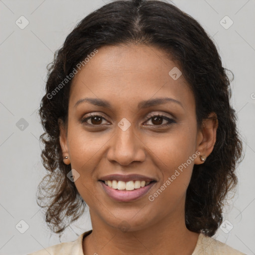 Joyful black young-adult female with medium  brown hair and brown eyes