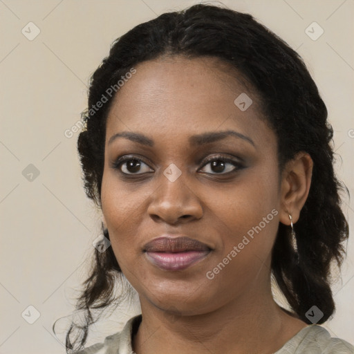 Joyful black young-adult female with medium  black hair and brown eyes