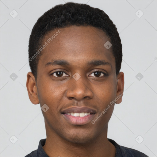 Joyful black young-adult male with short  brown hair and brown eyes