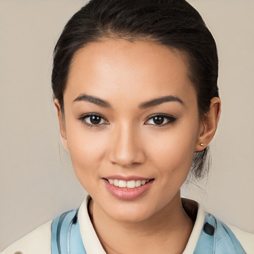 Joyful white young-adult female with medium  black hair and brown eyes