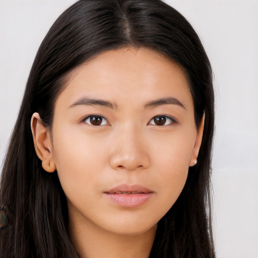 Neutral asian young-adult female with long  brown hair and brown eyes