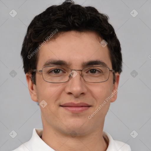 Joyful white adult male with short  brown hair and brown eyes