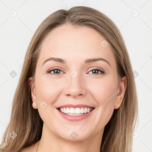 Joyful white young-adult female with long  brown hair and grey eyes