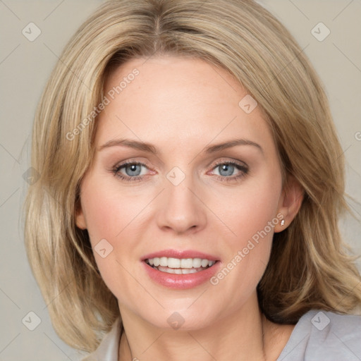 Joyful white young-adult female with medium  brown hair and green eyes