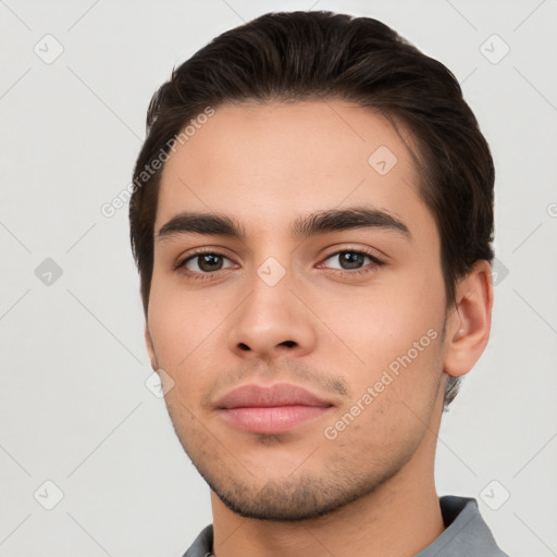 Neutral white young-adult male with short  brown hair and brown eyes