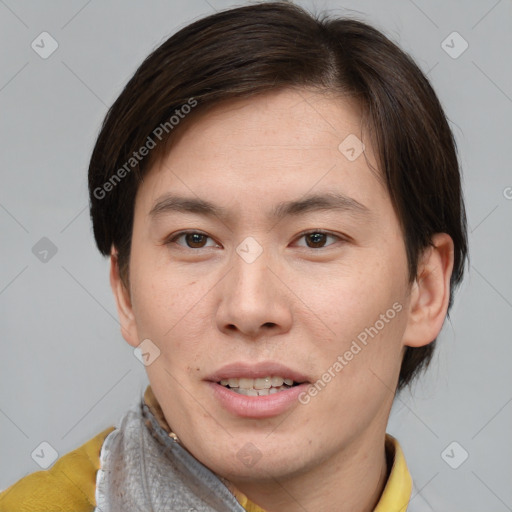 Joyful asian young-adult male with short  brown hair and brown eyes