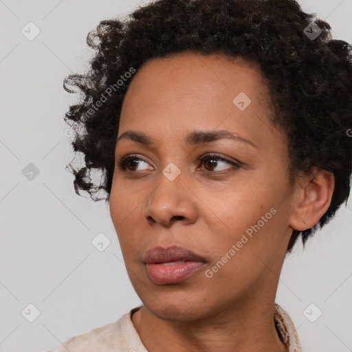 Neutral black young-adult female with short  brown hair and brown eyes