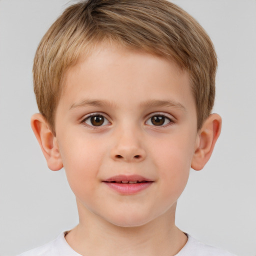 Joyful white child male with short  brown hair and brown eyes