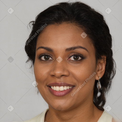 Joyful black young-adult female with medium  brown hair and brown eyes