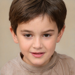 Joyful white child male with short  brown hair and brown eyes