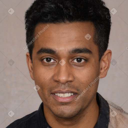 Joyful latino young-adult male with short  black hair and brown eyes