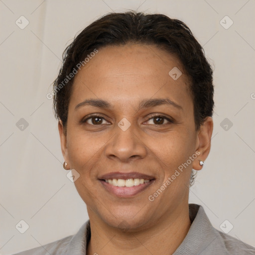 Joyful white adult female with short  brown hair and brown eyes