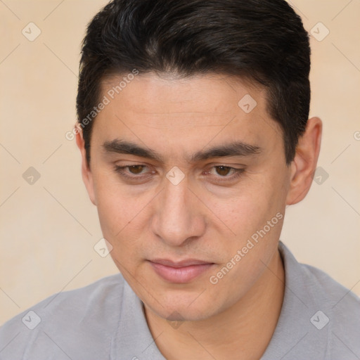 Joyful white young-adult male with short  brown hair and brown eyes