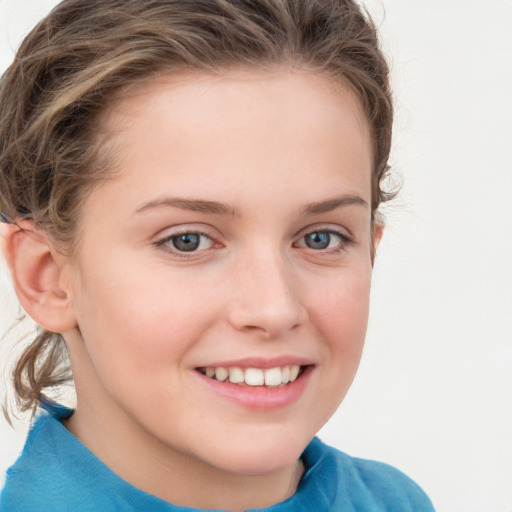 Joyful white child female with medium  brown hair and blue eyes