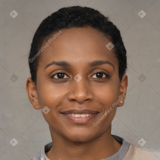 Joyful black young-adult female with short  black hair and brown eyes