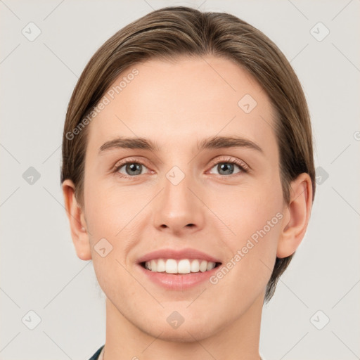 Joyful white young-adult female with short  brown hair and grey eyes