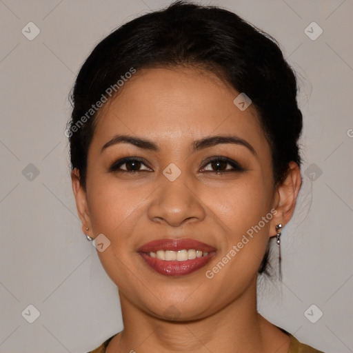 Joyful latino young-adult female with medium  brown hair and brown eyes