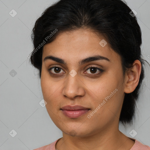 Joyful latino young-adult female with medium  brown hair and brown eyes