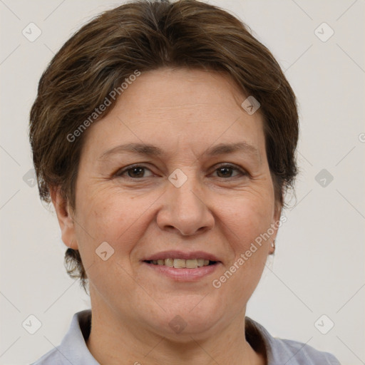 Joyful white adult female with short  brown hair and brown eyes