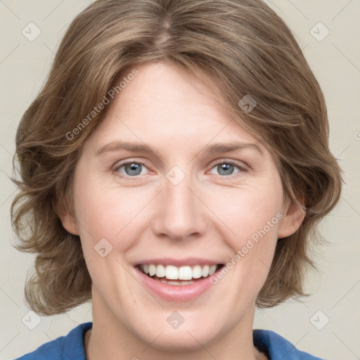 Joyful white young-adult female with medium  brown hair and blue eyes